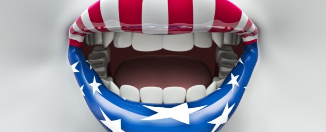 A mouth with an american flag painted on it.
