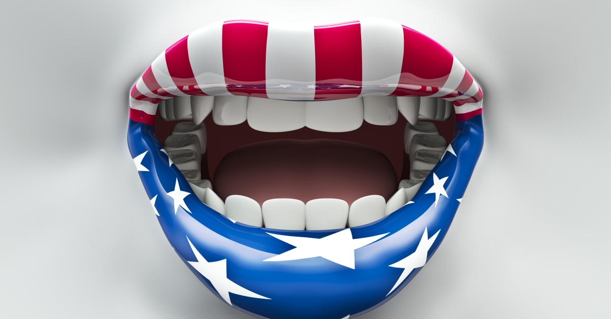 A mouth with an american flag painted on it.